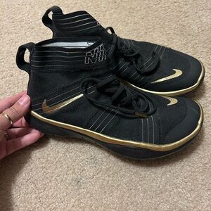 Nike Black and Gold High-Top Sneakers